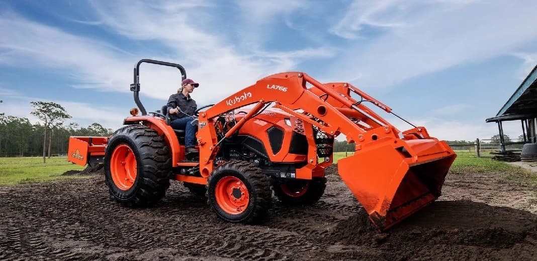 Tractor dumping dirt