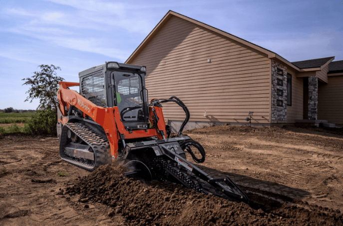 Track loader with front attachment