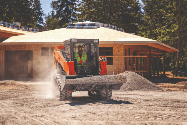 Track Loader moving dirt on site