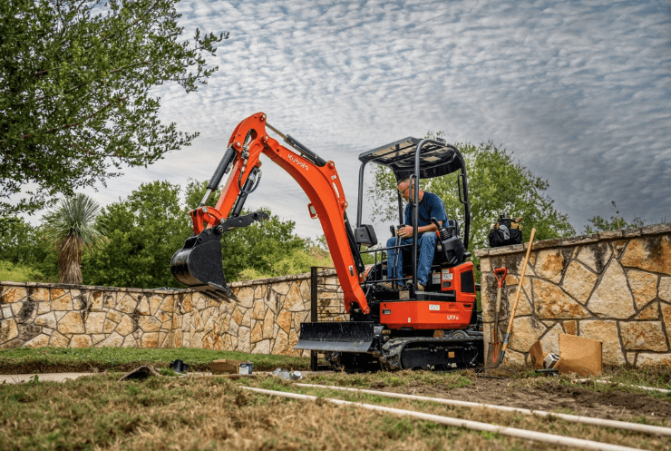 Excavator on site digging