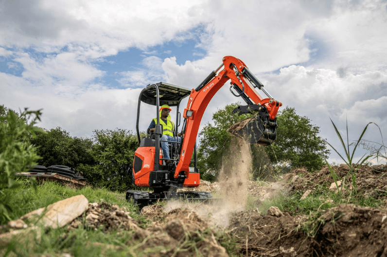 Compact Excavator digging 