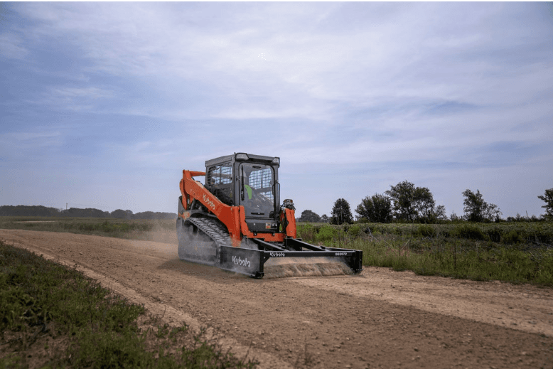 Track Loader with leveling attachment 